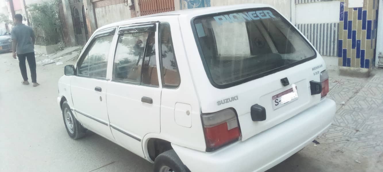 suzuki mehran 1991 model good condition white colour. petrol 4