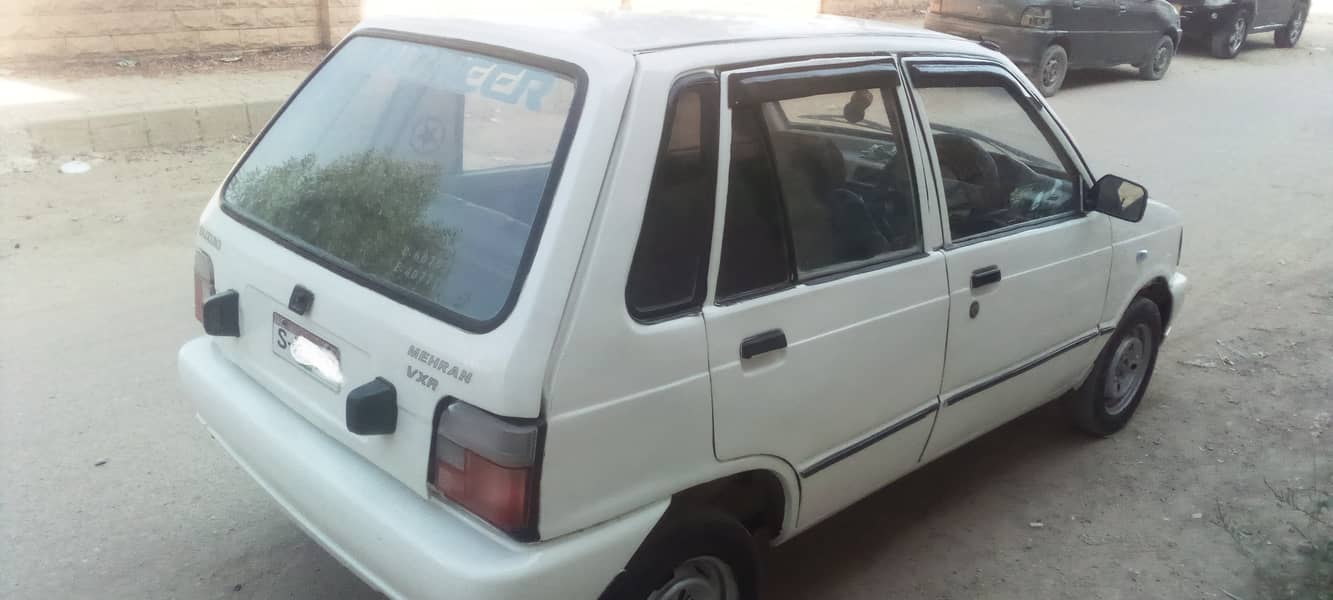 suzuki mehran 1991 model good condition white colour. petrol 5