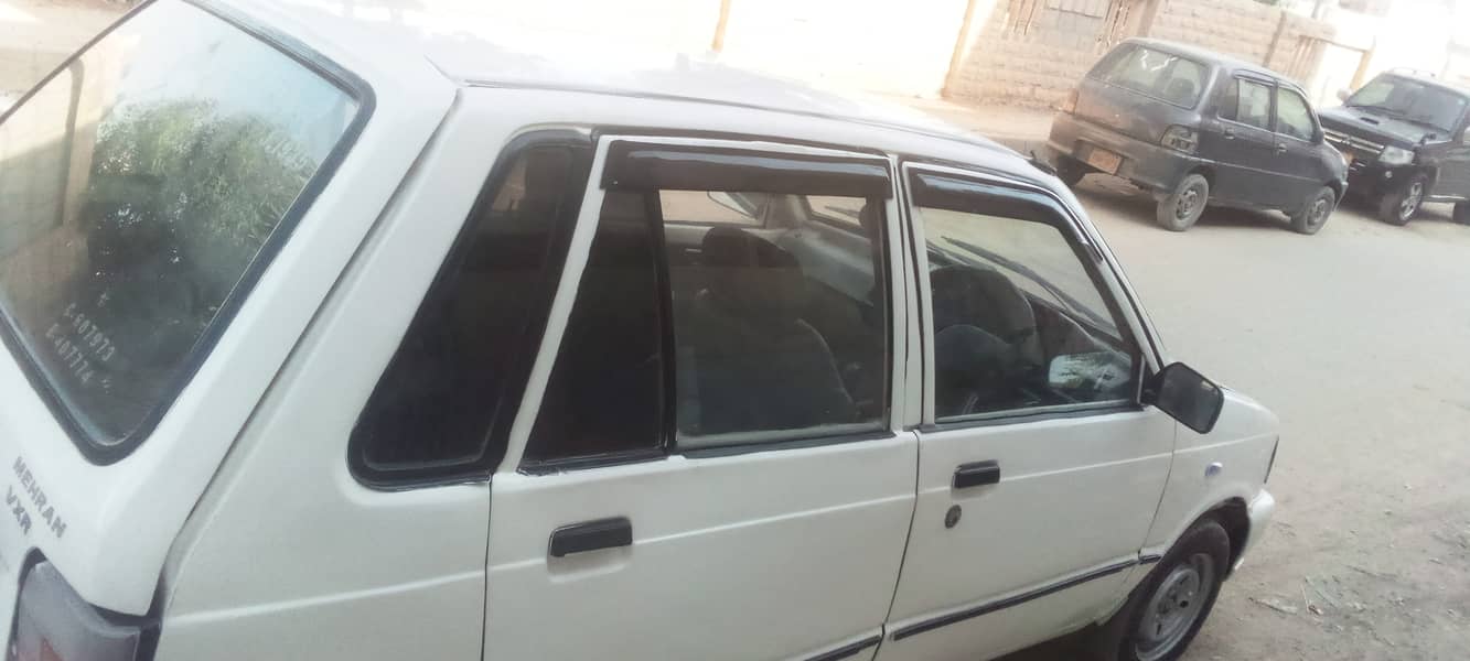 suzuki mehran 1991 model good condition white colour. petrol 11