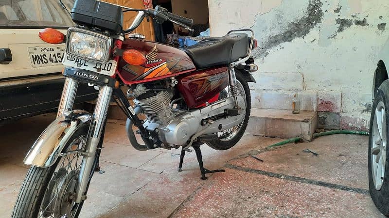 Honda 125 cc. total genuine. 3