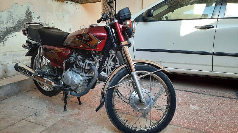 Honda 125 cc. total genuine. 4