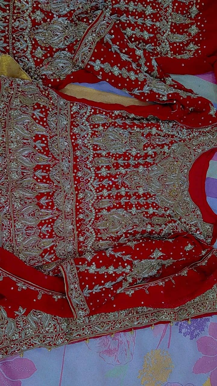 Luxury Bridal Lehenga – Stunning Red & Gold Embroidery 1