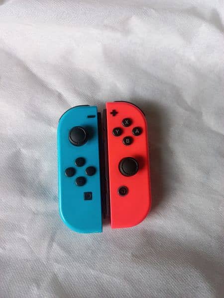 Nintendo Switch with box and other accessories with 3 games 3