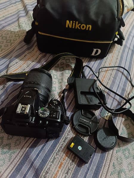 Nikon D5300 with lens 18-105mm 0