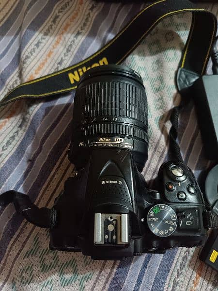 Nikon D5300 with lens 18-105mm 1