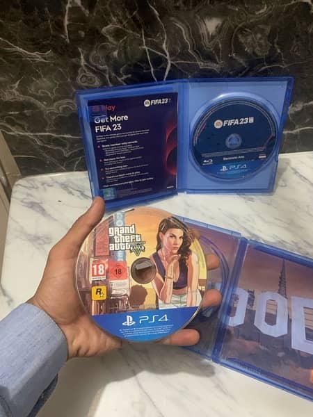 PS4 GAMES GTA V AND FIFA 23 FOR SALE 4