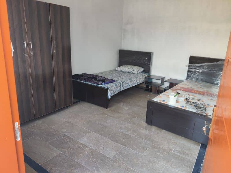 malik boys hostel gulberg sharing furnished rooms 5