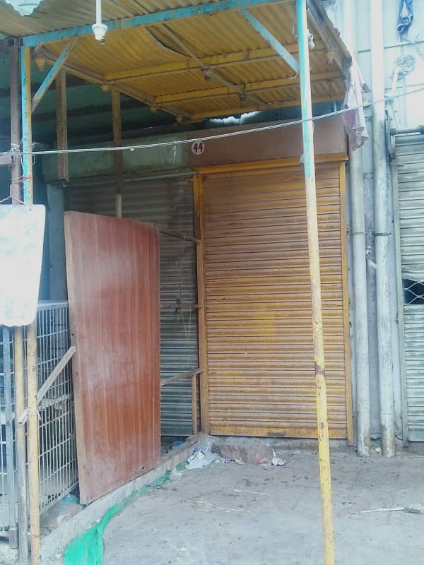 FRONT SHOP FOR SALE MAIN RUNNING ROAD NEAR KE OFFICE SECTOR 11A 0