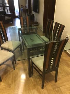 glass top  six seater dining table for sale