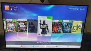 Xbox 360E with box and 24 inch bazzel less monitor