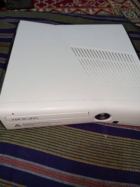 Xbox 360s with kinect sensor and games 1