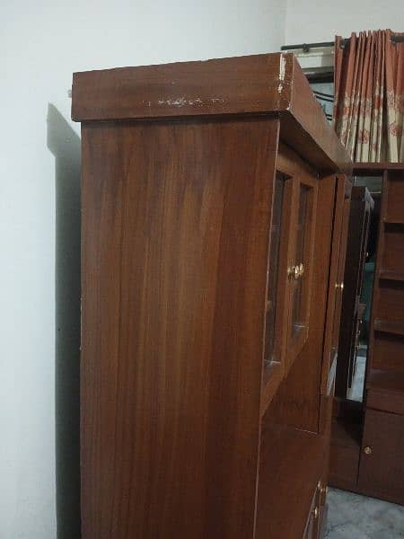 we are selling pure wooden showcase in good condition 1