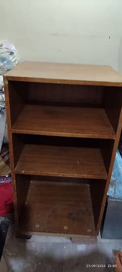 3 shelf wooden  cabinet for sale . price:fixed.