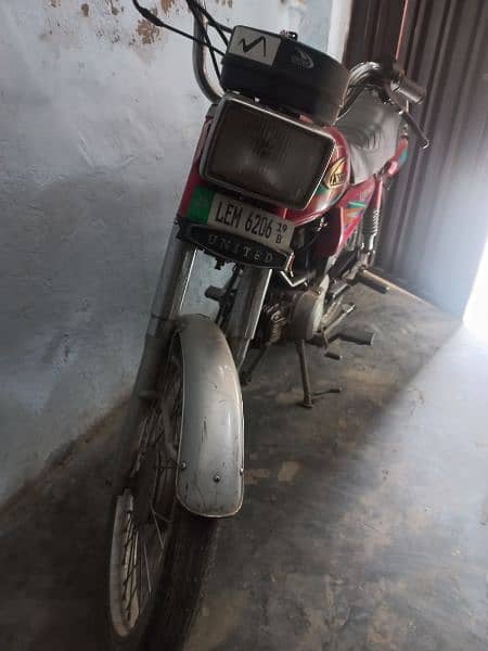 United 100 cc for sale , also attached with rickshaw. 3