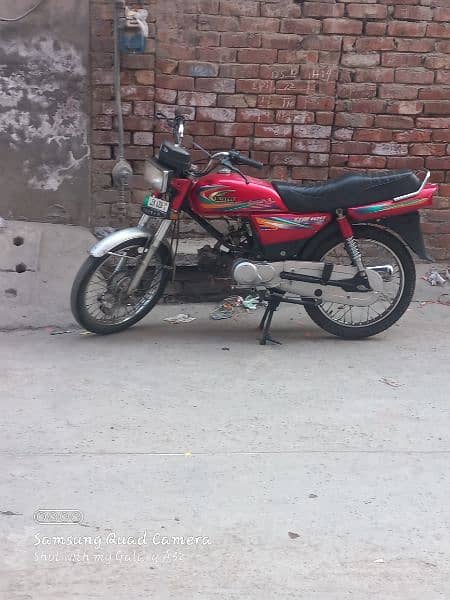 United 100 cc for sale , also attached with rickshaw. 4