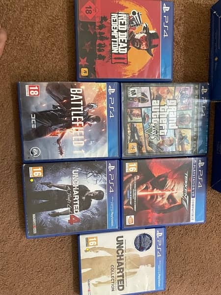 ps4 fat for sell along with 2 controllers and 6 cds 1