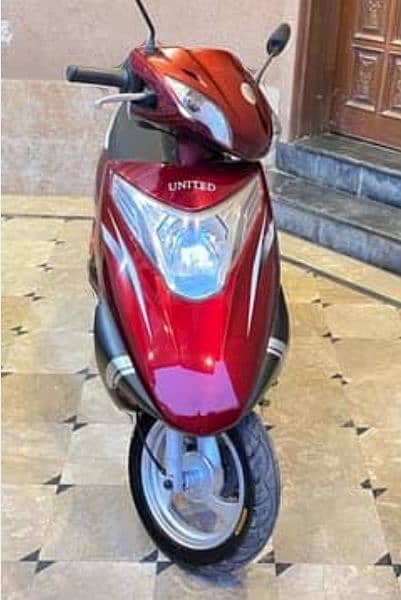 United 100 cc scooty . 1