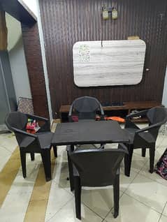 Brown Plastic Table with 4 Chairs