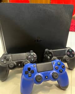 PS4 slim with 3remotes and 5cds