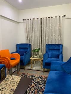 7 seater sofa, wooden Table, lamp, glass vase For sale. 10/10 condition 0