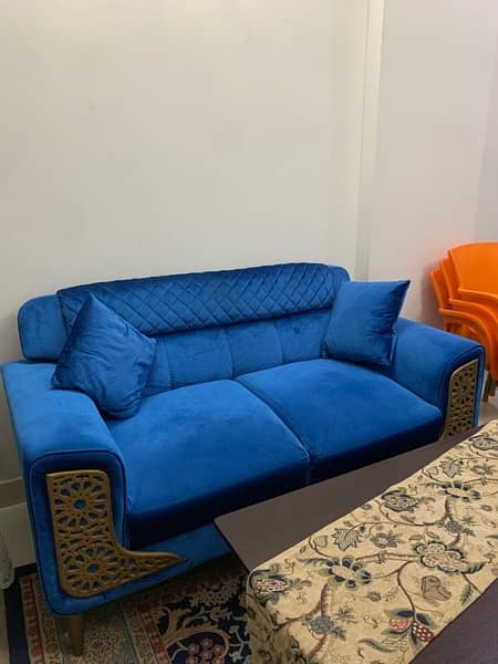 7 seater sofa, wooden Table, lamp, glass vase For sale. 10/10 condition 2