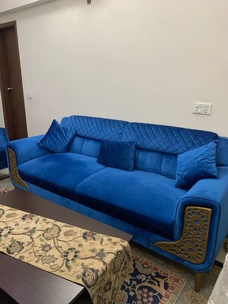 7 seater sofa, wooden Table, lamp, glass vase For sale. 10/10 condition 3