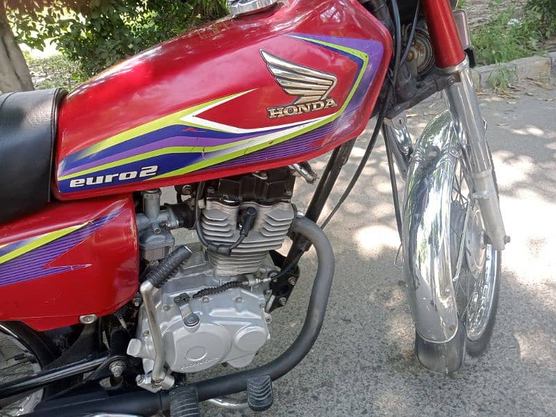 Honda 125 Red Color/03307987830 1