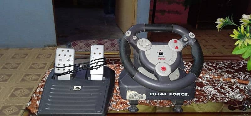 gamester dual force steering wheel for playstation 0