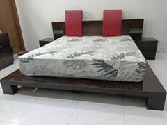 bed and side table 0