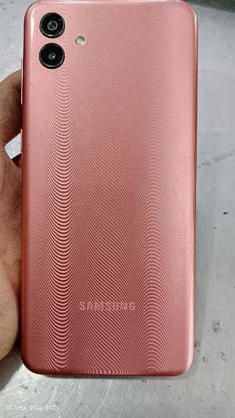 Samsung a04 open box with charger 3