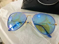 Ray. Ban branded sunglasses Blue and green colors available