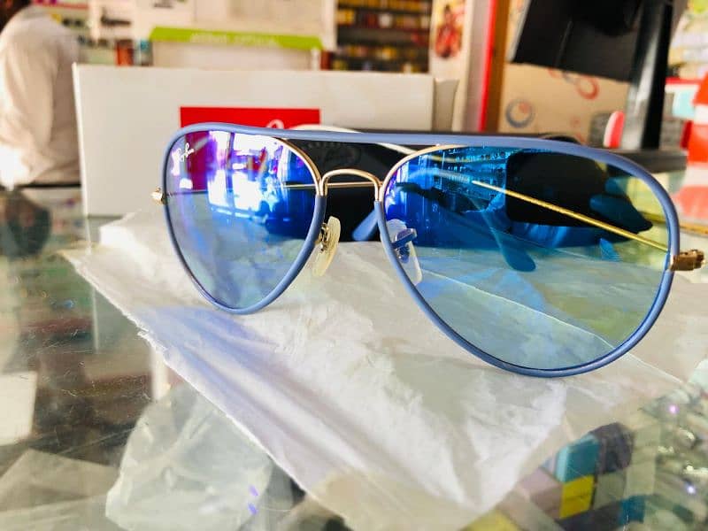 Brand New Ray. Ban sunglasses color green and blue with branded box 9