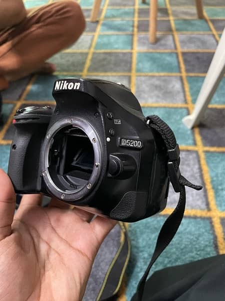 Nikon dslr d5200 with 200mm lens 8