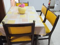 solid wooden dining table and 4 chairs