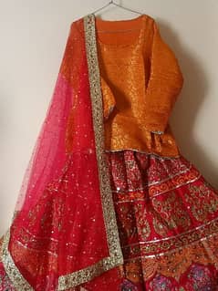 3 pc woman printed lehnga with dupatta and stitched shirt.