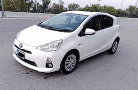 Toyota Aqua, Islamabad number, pearl white colour