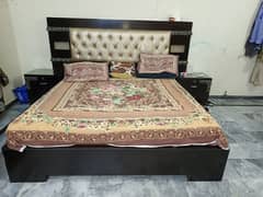 Double bed with side tables and dressing