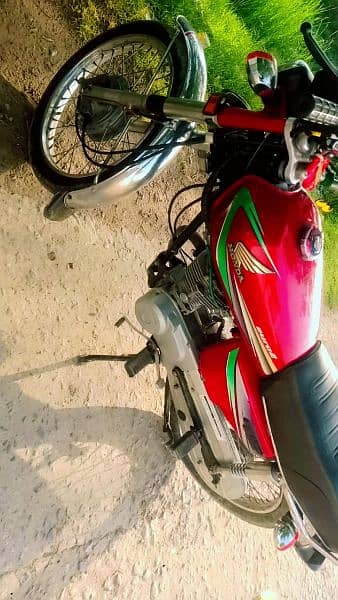 Honda 125 2013 model Rawalpindi number call me 03145842954 8