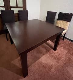 Elegant dining table with 4 chairs