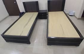 2 single bed and centretable