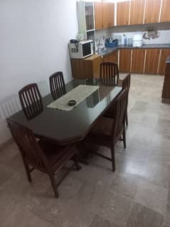 Wooden table with 6 chairs