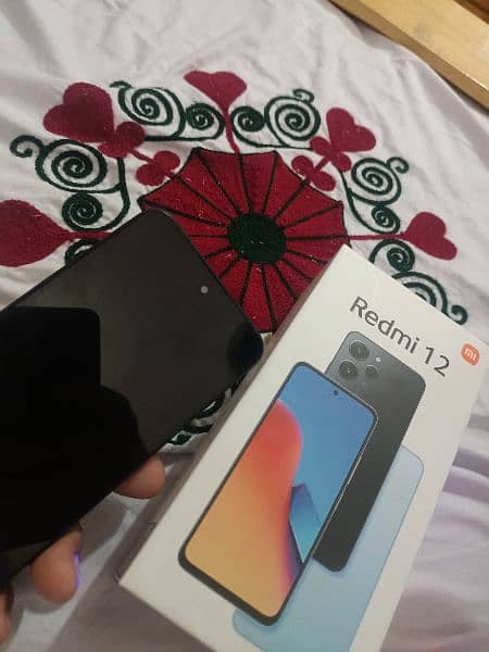 Redmi 12 8REM/128 storeg 3