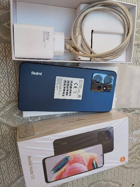 Redmi note 12 complete box 8+4gb/128gb with warranty 5 month 10/10 1