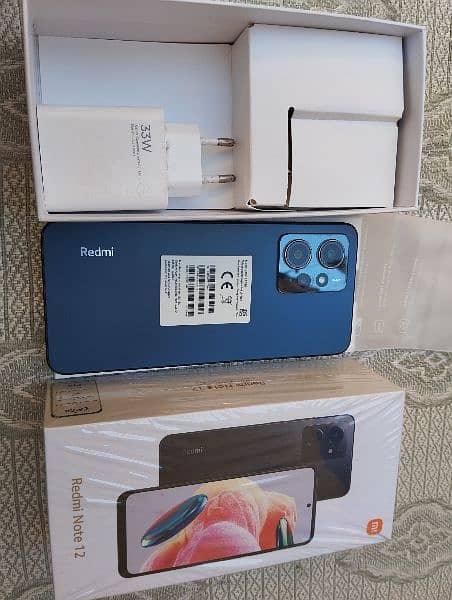 Redmi note 12 complete box 8+4gb/128gb with warranty 5 month 10/10 2