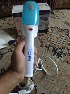 topi steam iron