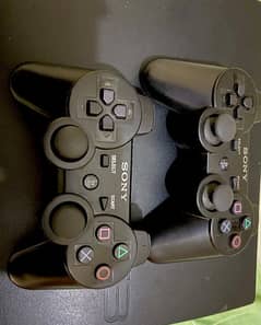 Playstation With 2 controllers and 4cds.