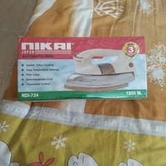 nikai automatic iron  in packing not opened yet