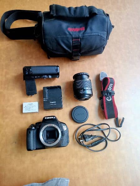 Canon 600d with 18 55mm autofocus lense lush condition with grip 9