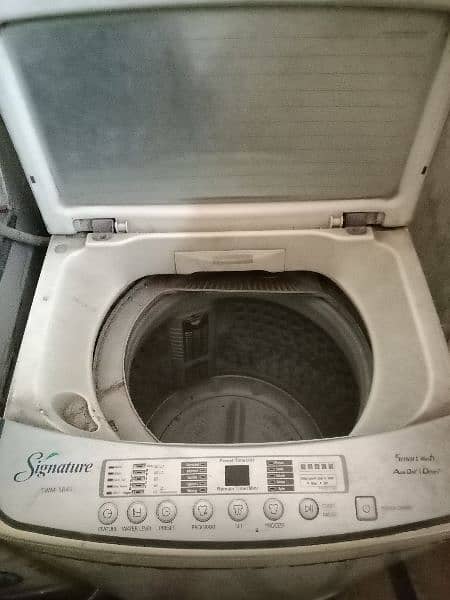 signature washing machine and dryer 1