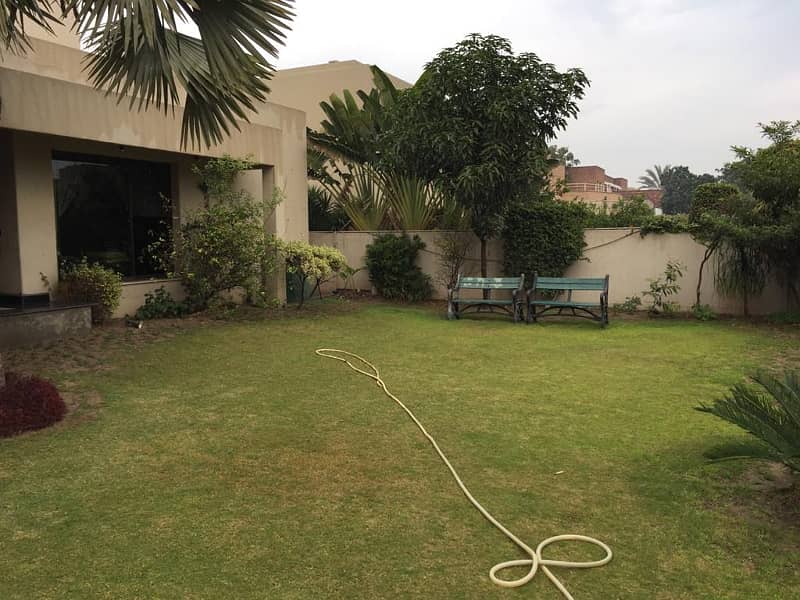 1 Kanal Like brand new Bungalow with 1kanal lush green lawn Available For Rent In DHA Phase 5 With Super Hot Location 1